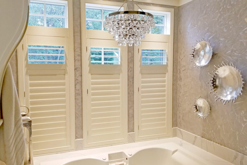 Shutter Partially Open Over Bathtub