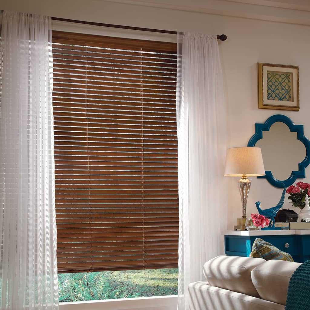 fall day through the window blinds