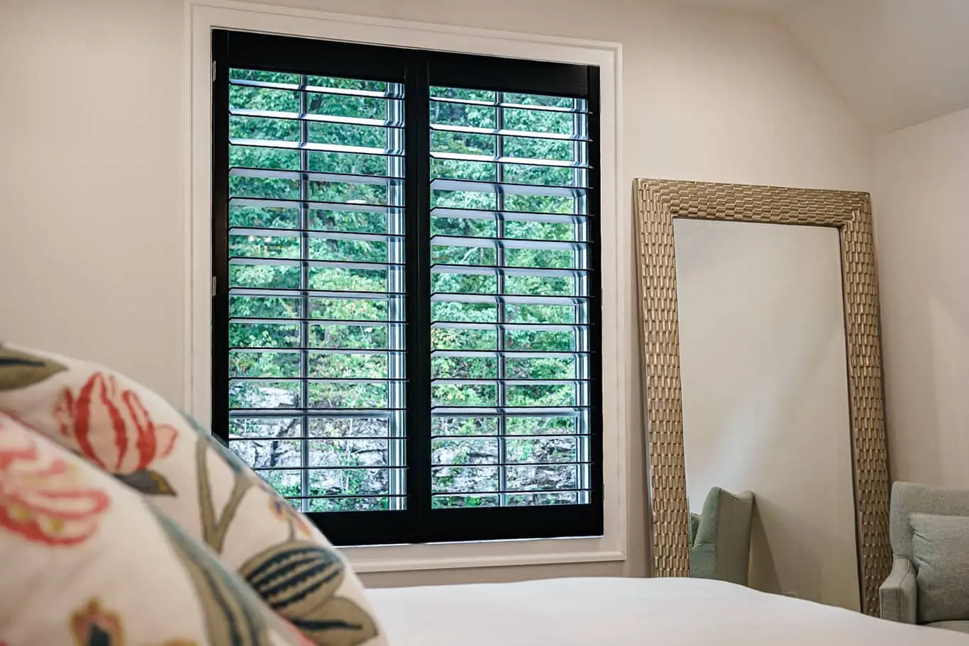 modern black shutters in a bedroom