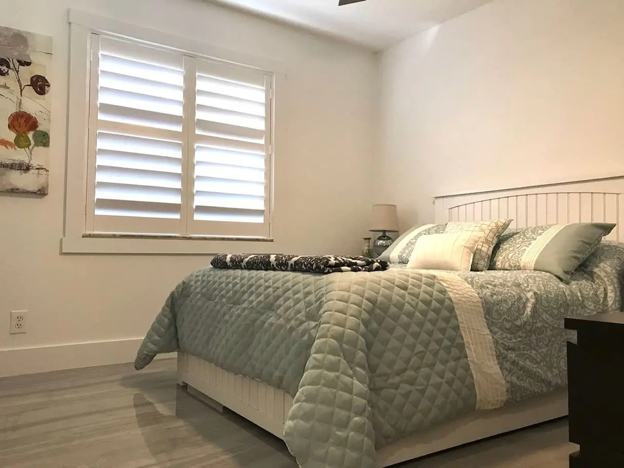 plantation shutters in a bedroom