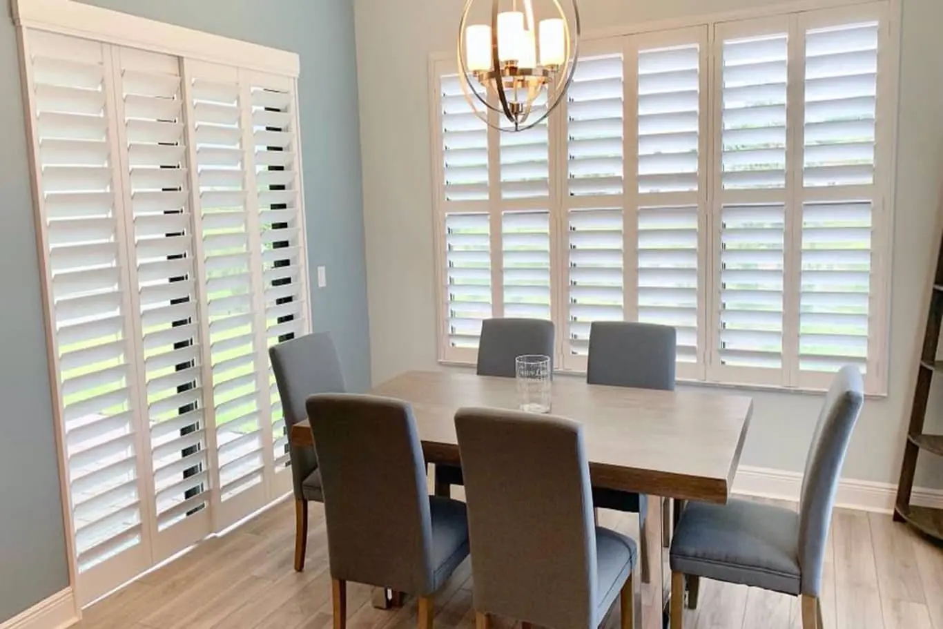 plantation shutters on sliding glass door and window