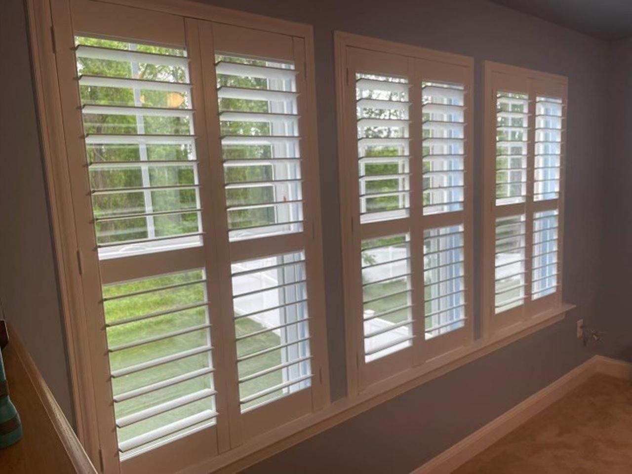 Louverwood shutters on triple window