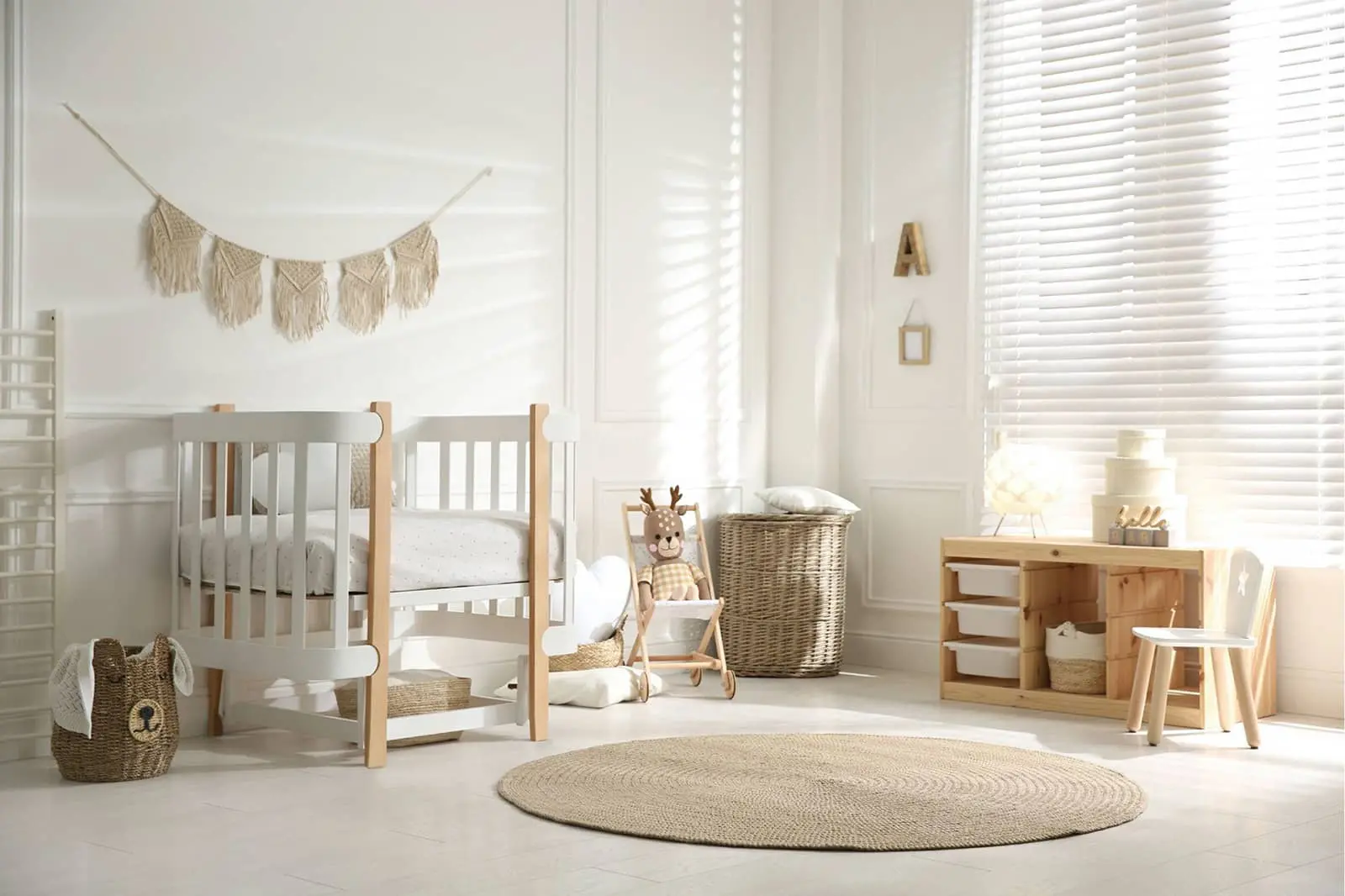 white cordless blinds in a nursery